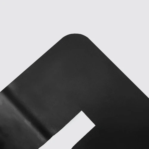 Metal surface with black oxidizing finish.