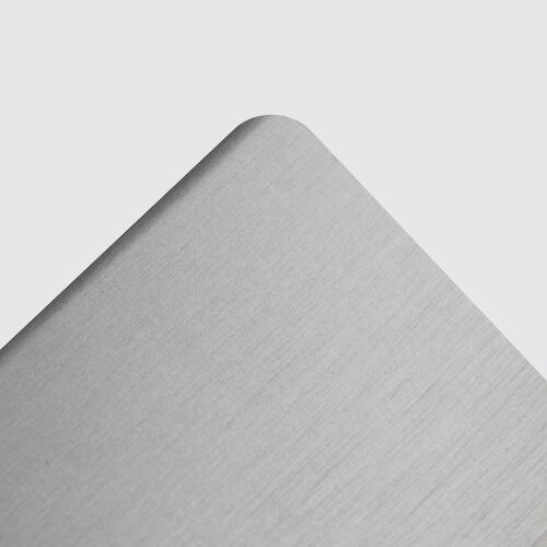 Close-up of brushed aluminium sheet metal surface finish.