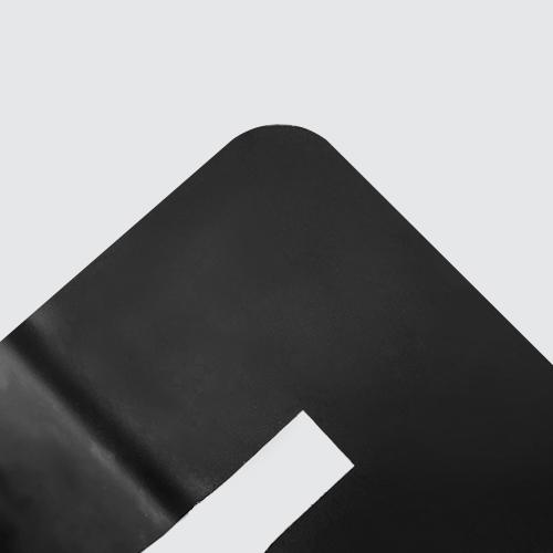 Close-up of matte black painted sheet metal surface.
